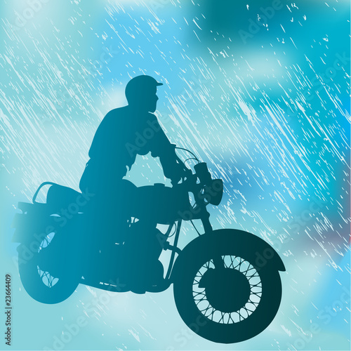 Motorcyclist In The Rain