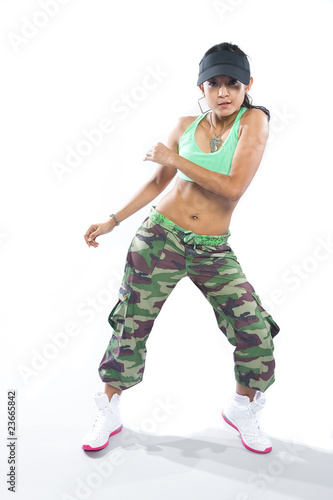 Beautiful woman hip hop dancer striking a pose