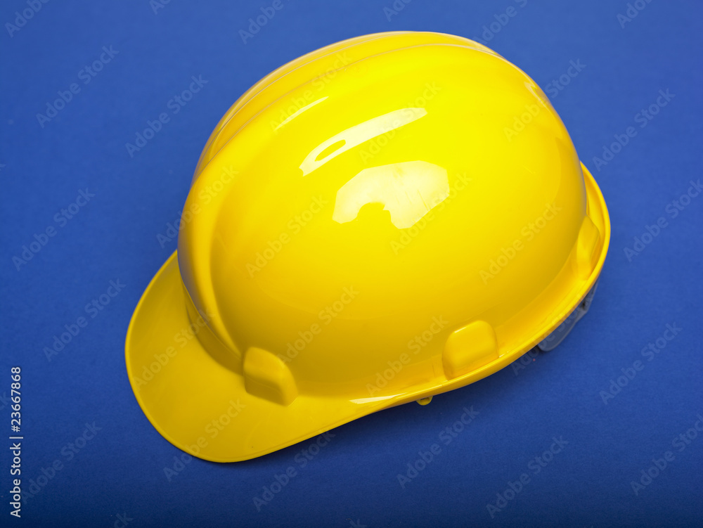 Fototapeta premium Yello Hardhat On Blue