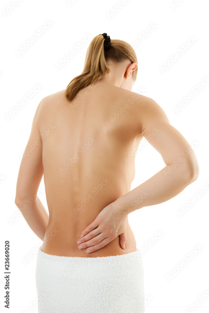 Naklejka premium Woman massaging pain back isolated on white