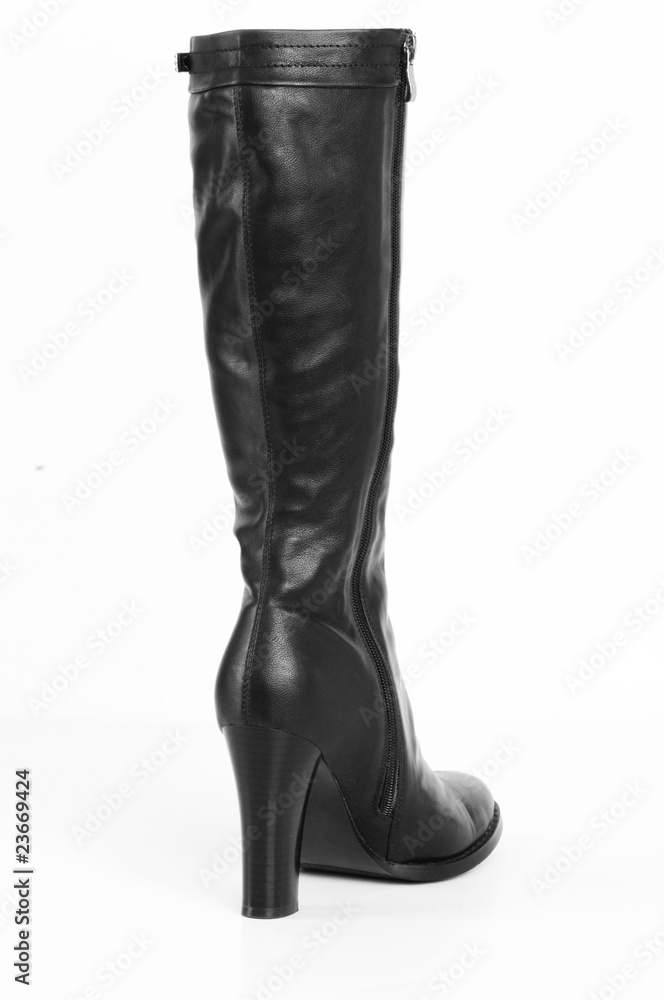 Black boots isolated on the white background Black boots isolated on the white background