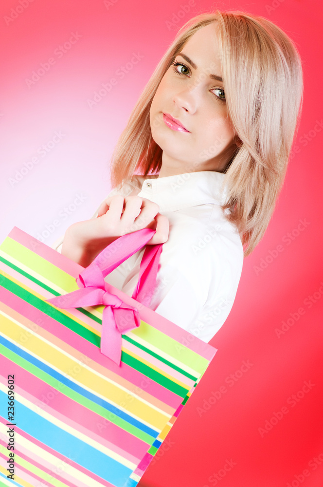 Blond girl with shopping bag Blond girl with shopping bag