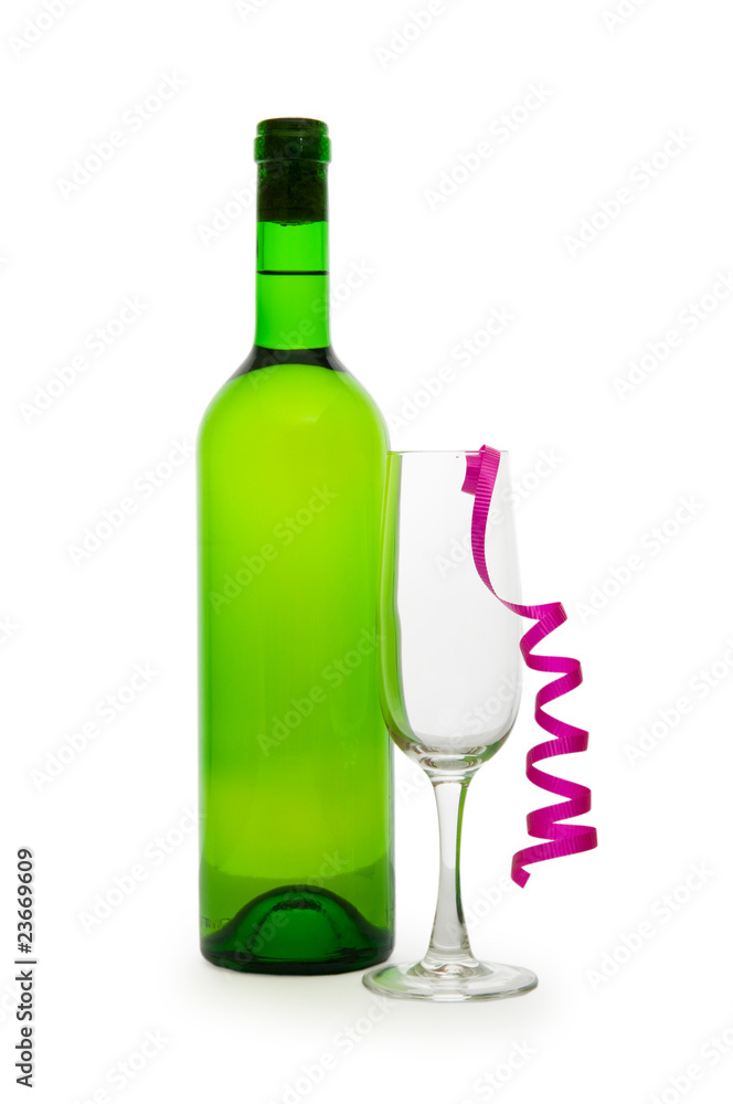 Bottle of wine and glass with streamer on white Bottle of wine and glass with streamer on white