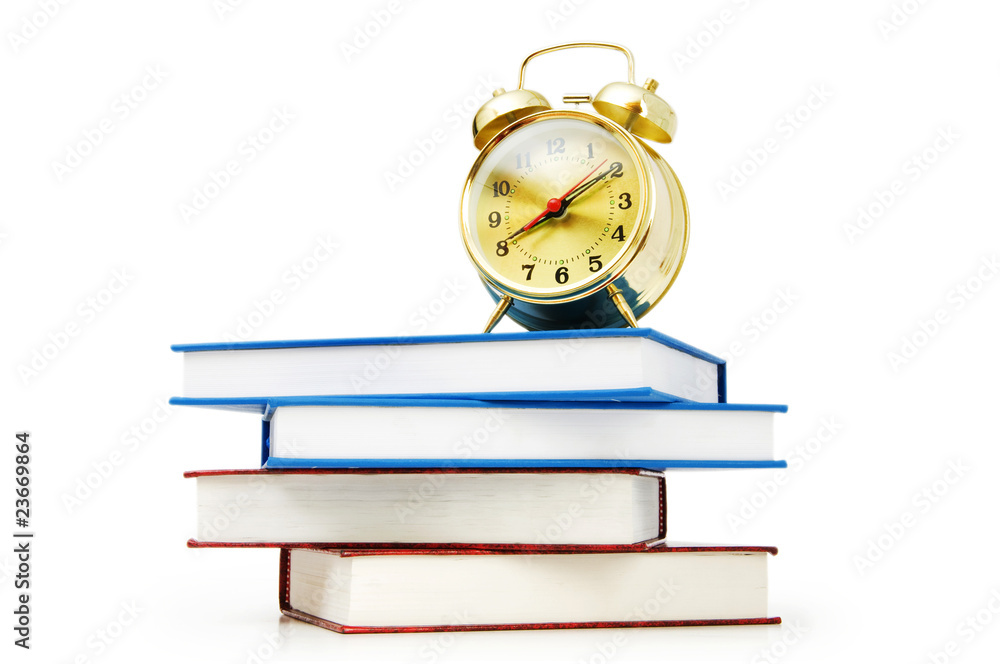 Back to school concept with books and clock Back to school concept with books and clock