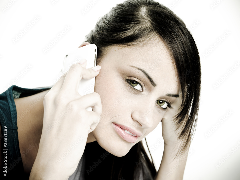 Fototapeta premium Young woman on phone