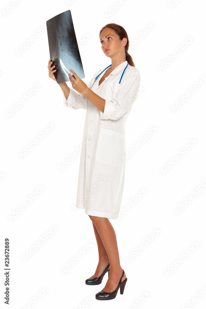 Female doctor looking at an x-ray image. Isolated on a white bac Female doctor looking at an x-ray image. Isolated on a white bac