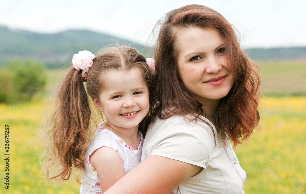 Mum with a daughter on the nature Mum with a daughter on the nature