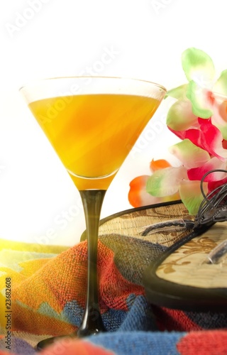 orange cocktail,Hawaiian lei and bright sunshine photo