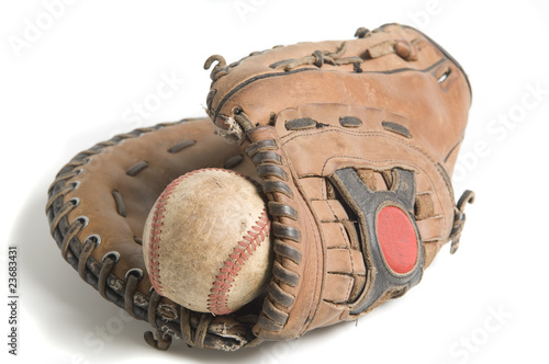 Baseball in glove isolated on white