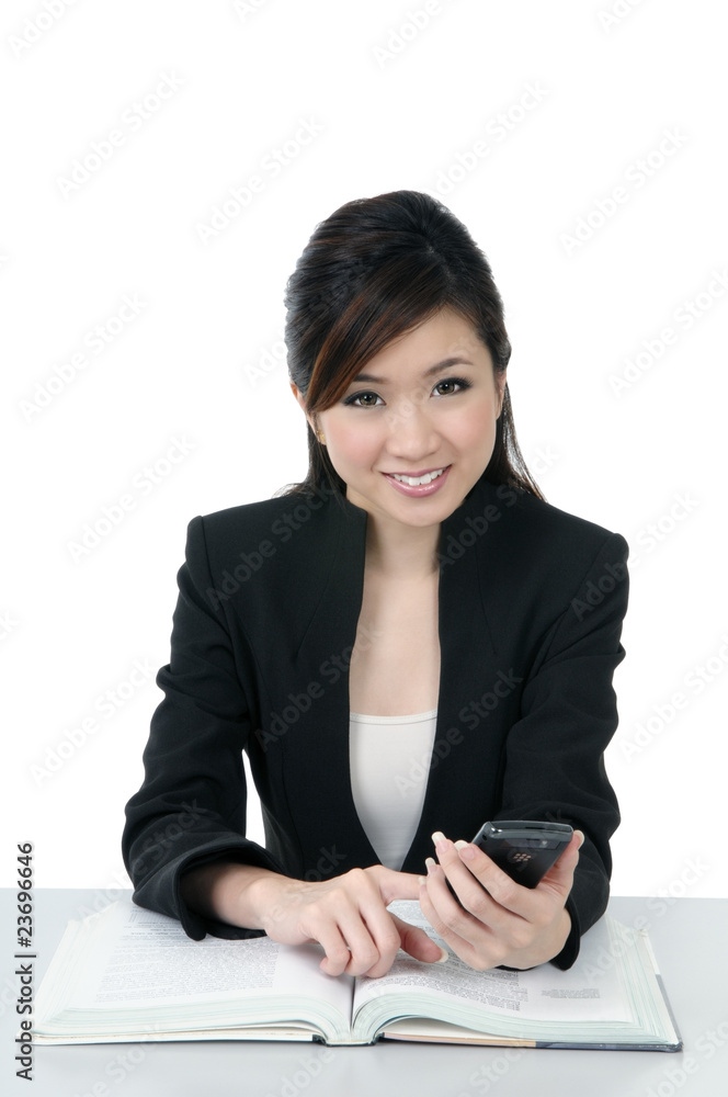 Beautiful young businesswoman holding cellphone Beautiful young businesswoman holding cellphone