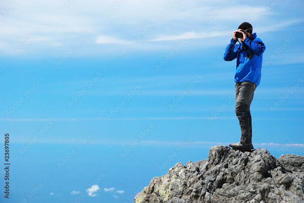 Fototapeta premium Photographer on top of the mountain