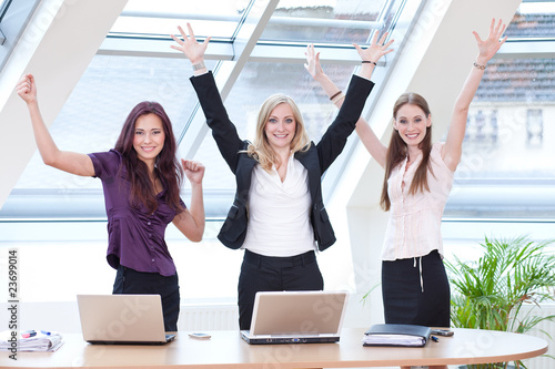 three women jubilating photo