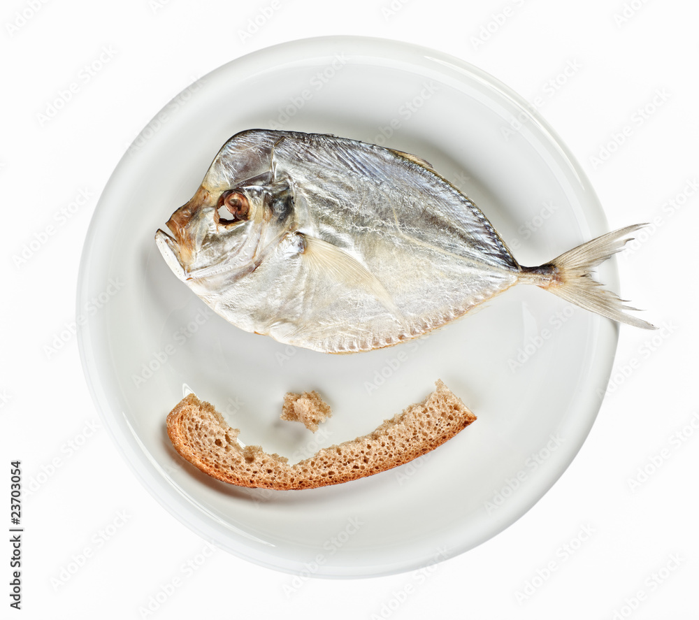 Salted moonfish with crust of bread on white plate Salted moonfish with crust of bread on white plate