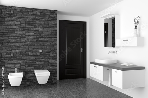 modern bathroom with black stone wall and white equipment