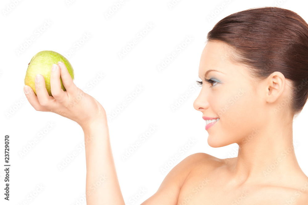 young beautiful woman with green apple young beautiful woman with green apple