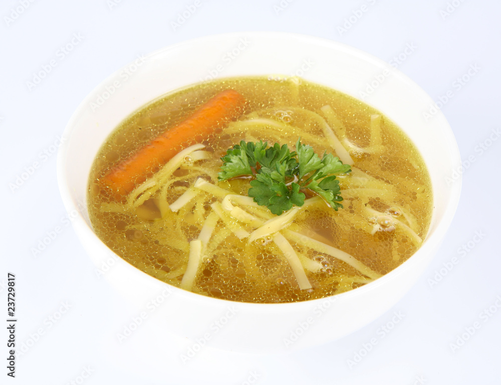 Chicken soup with macaroni and carrots with parsley in a bowl Chicken soup with macaroni and carrots with parsley in a bowl