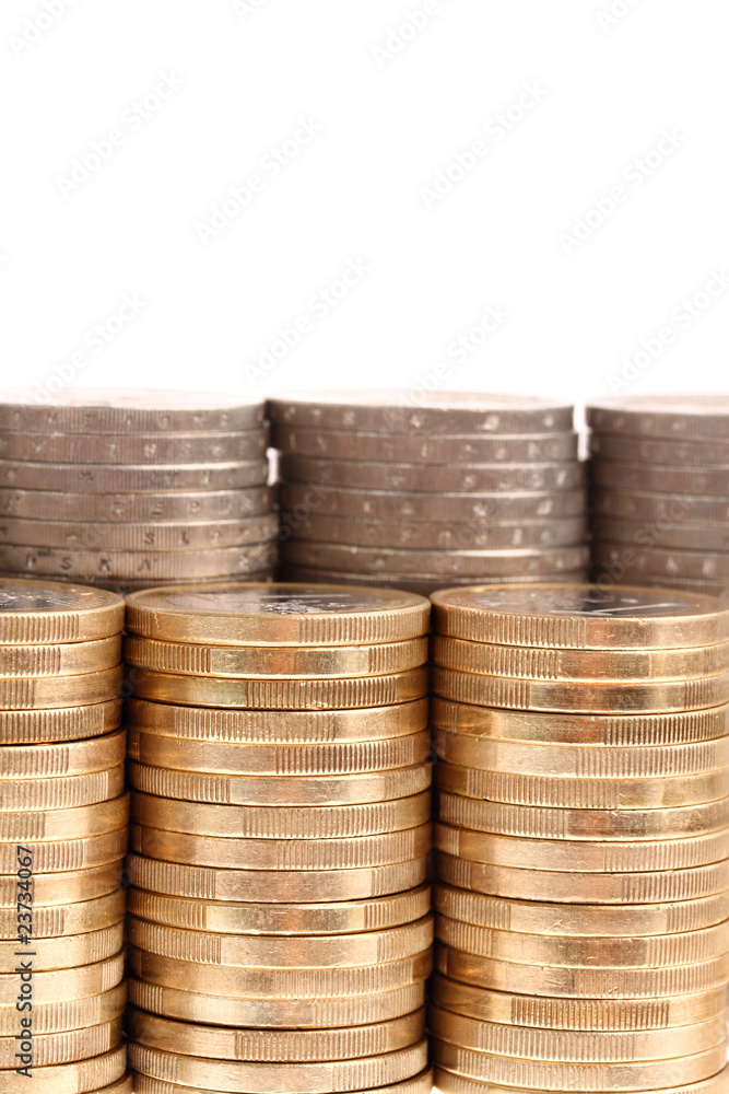 Coins organized in columns and rows isolated on white background Coins organized in columns and rows isolated on white background