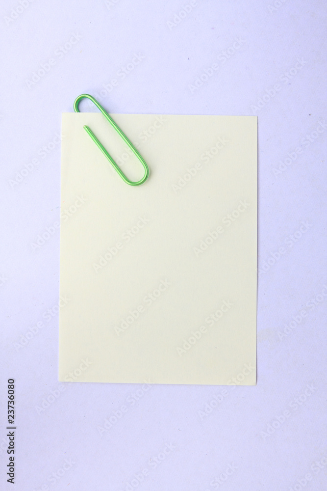 yellow memo with green clips yellow memo with green clips