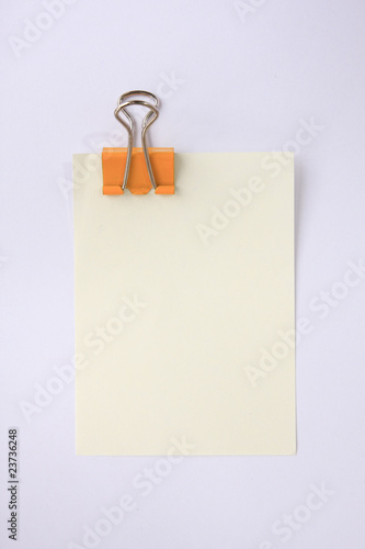 orange clip with yellow paper