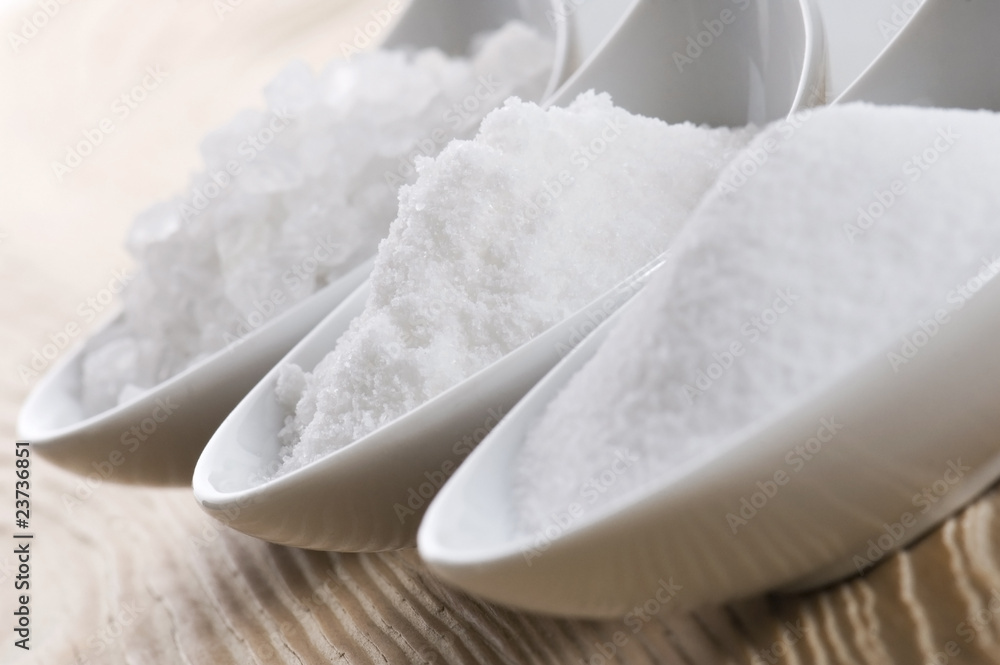 three spoons with different salt three spoons with different salt