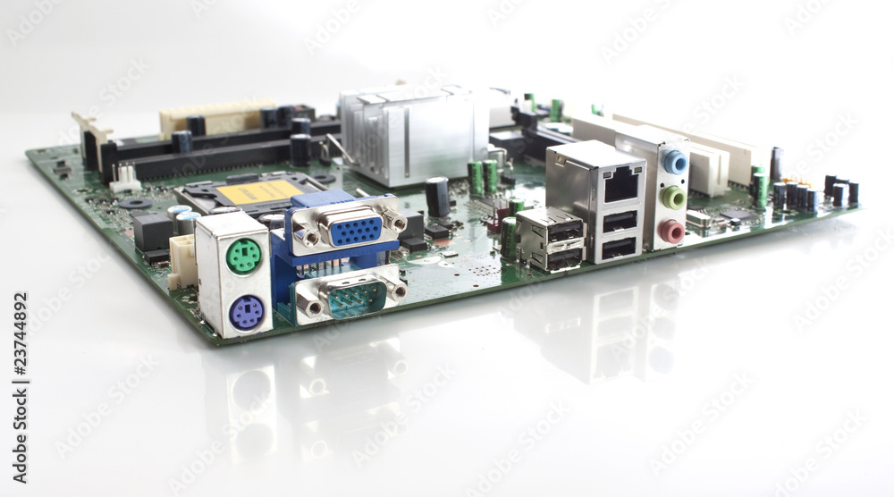 a computer mothboard angled view a computer mothboard angled view