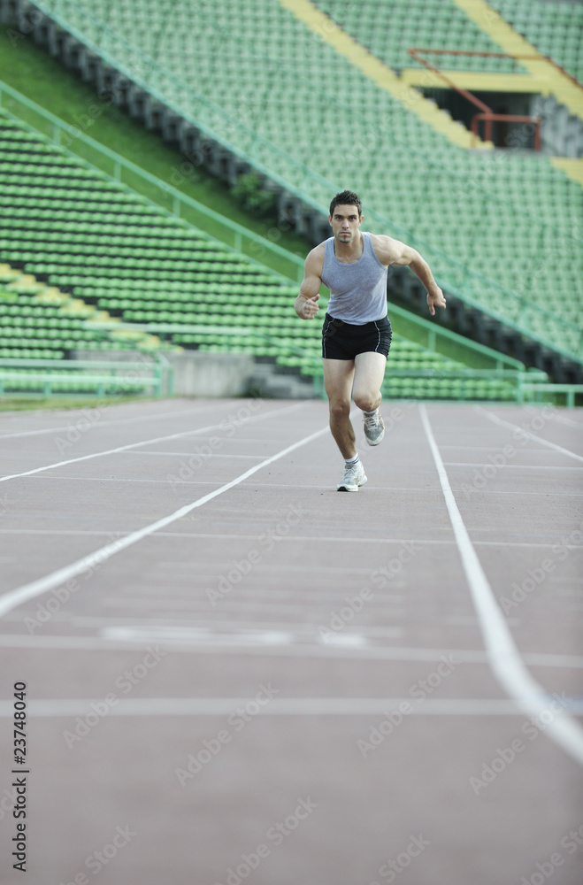 Obraz premium young athlete running