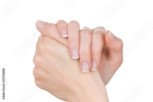 Woman hands with french manicure isolated on white