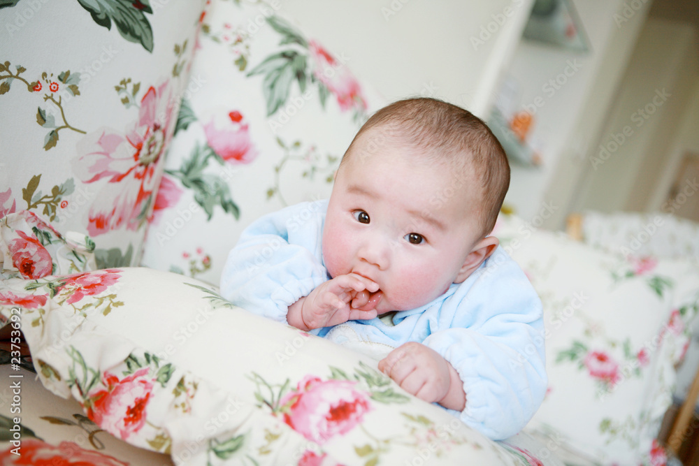 Cute little baby playing on the bed Cute little baby playing on the bed