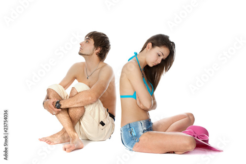 Obraz na płótnie young couple in beach clothes quarreled w salonie