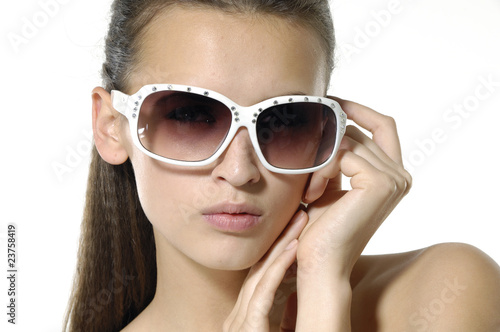 fashion model wearing modern sunglasses.