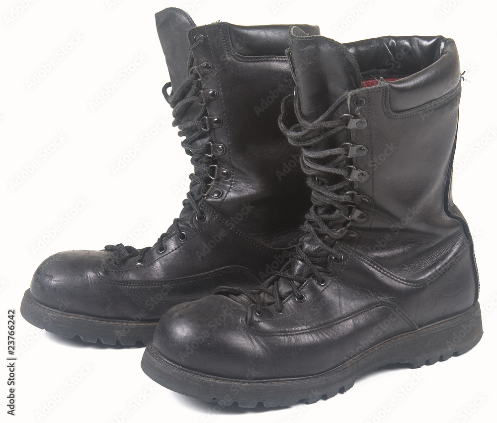 black military leather boots on white background
