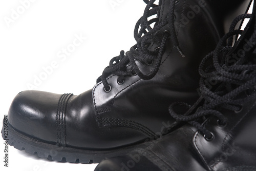 Slika na platnu steel toe black leather boots on white background