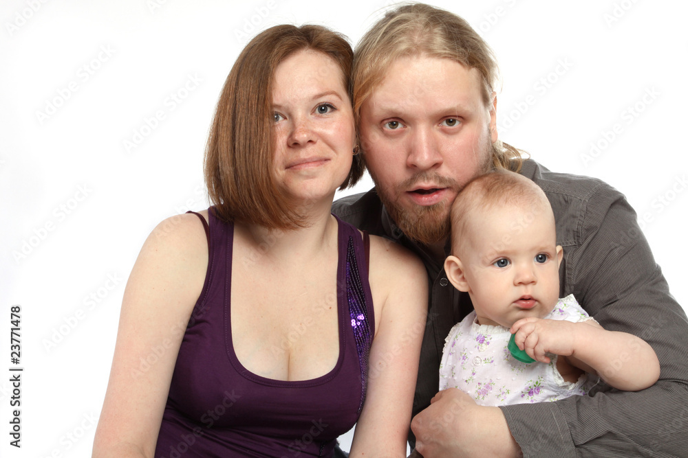 Beautiful young family: father, mother and baby Beautiful young family: father, mother and baby