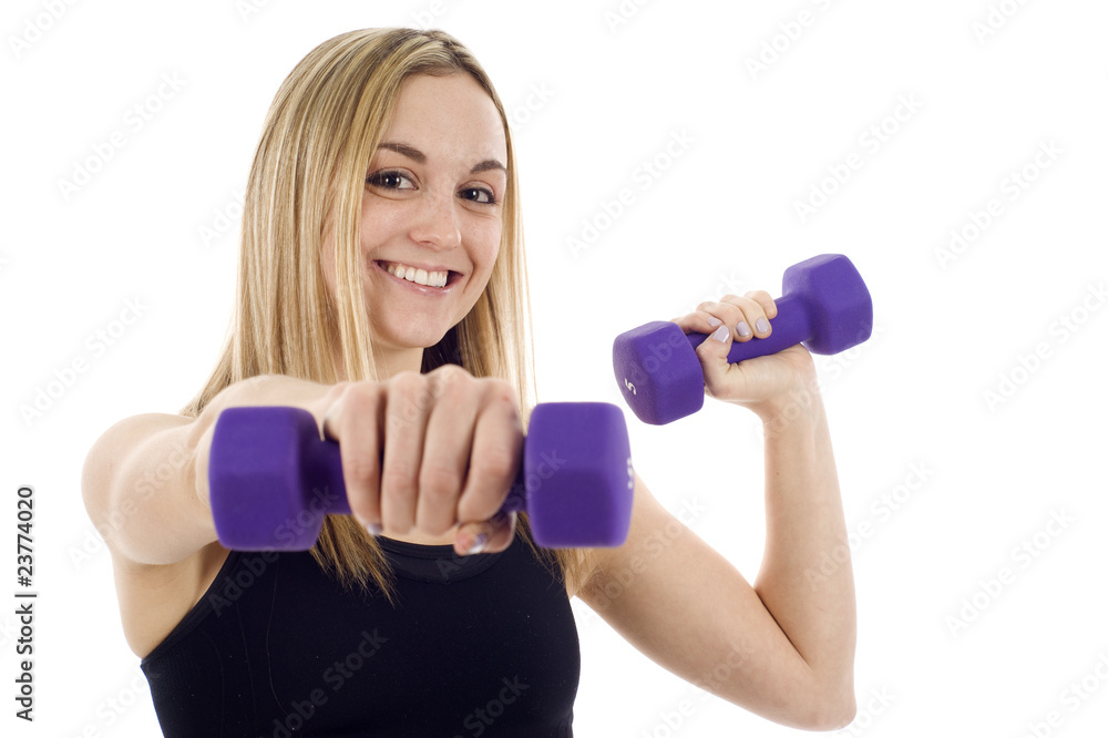 Woman working out with dumbbells Woman working out with dumbbells