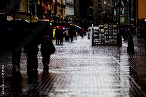 widely known Arbat street in Moscow in raining summer day photo