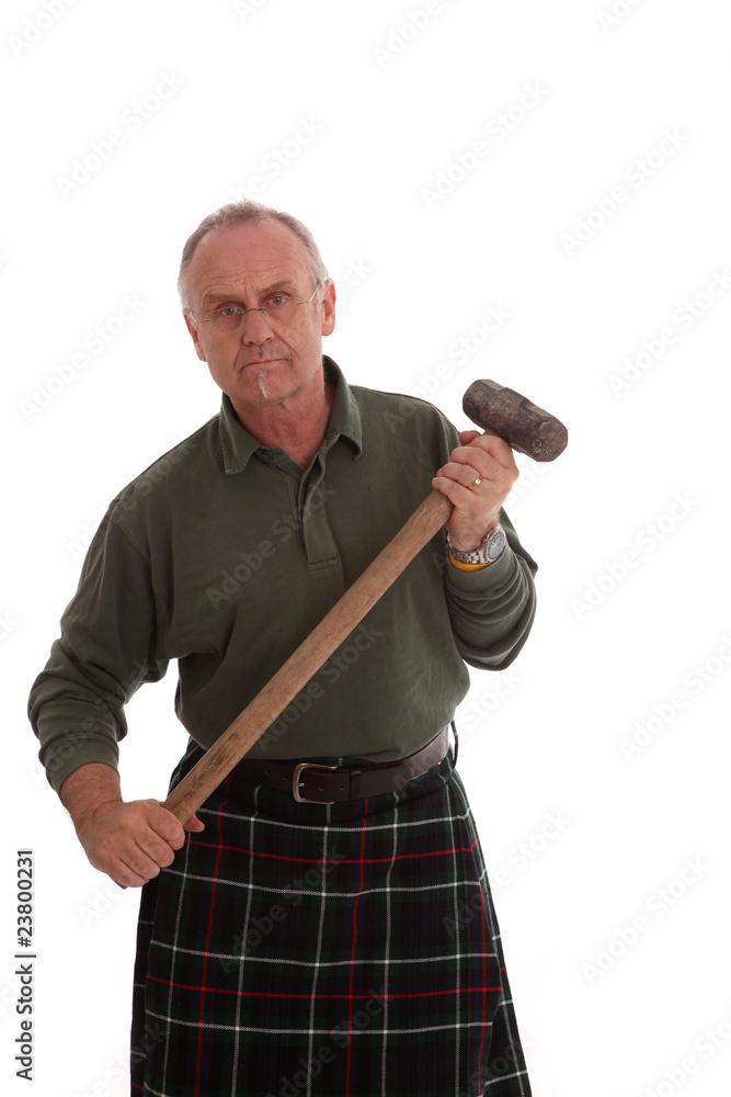 Working Scotsman with a large hammer Working Scotsman with a large hammer