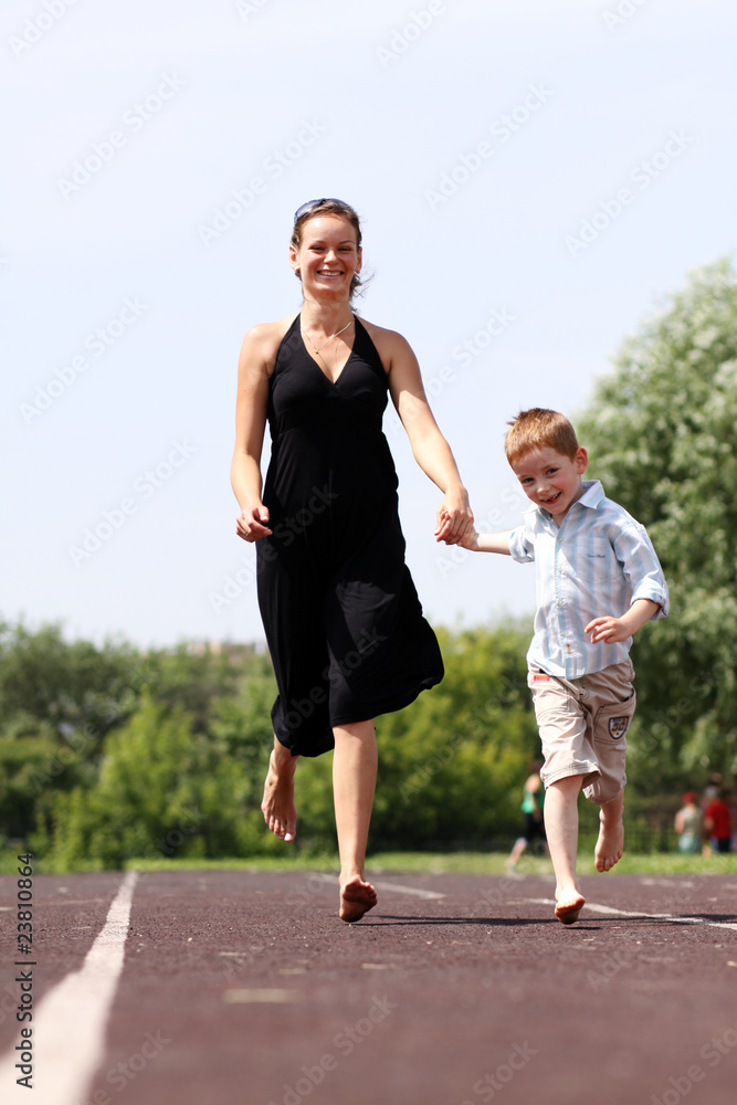 Happy mother and her little son outdoors session Happy mother and her little son outdoors session