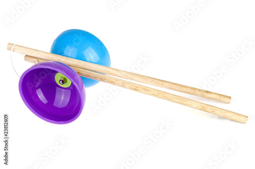 a colorful diabolo with sticks