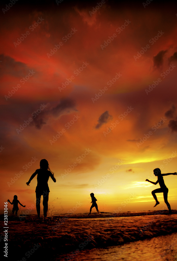 an image of children at the beach