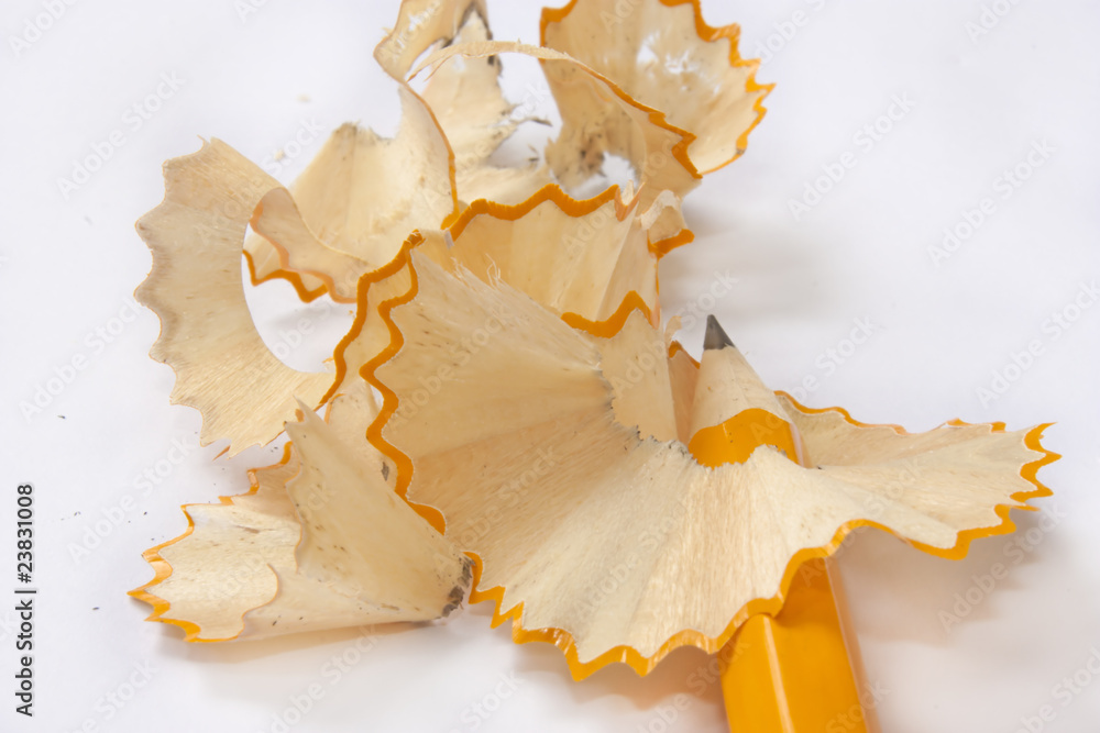Sharp pencil and curling shavings Sharp pencil and curling shavings