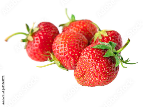 red strawberry fruits isolated on white background .
