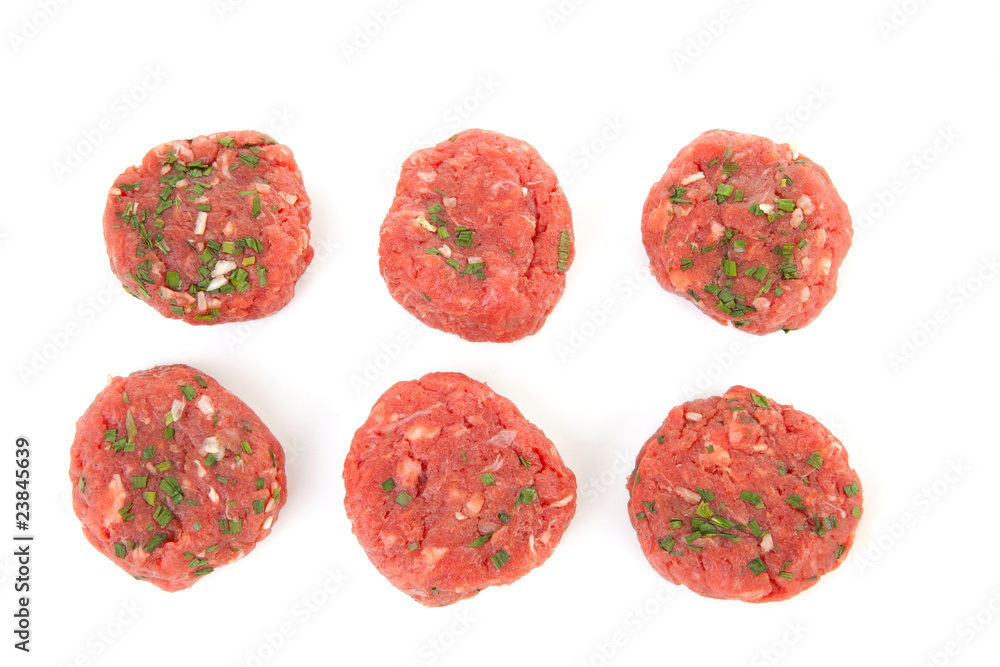 raw german beef over white background raw german beef over white background