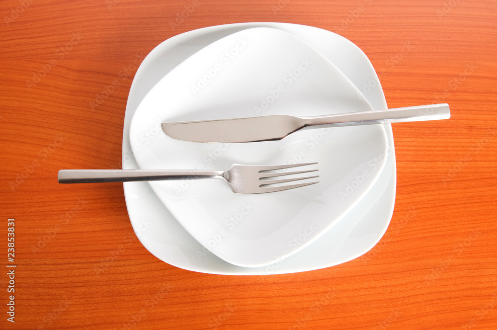 Set of utensils arranged on the table Set of utensils arranged on the table