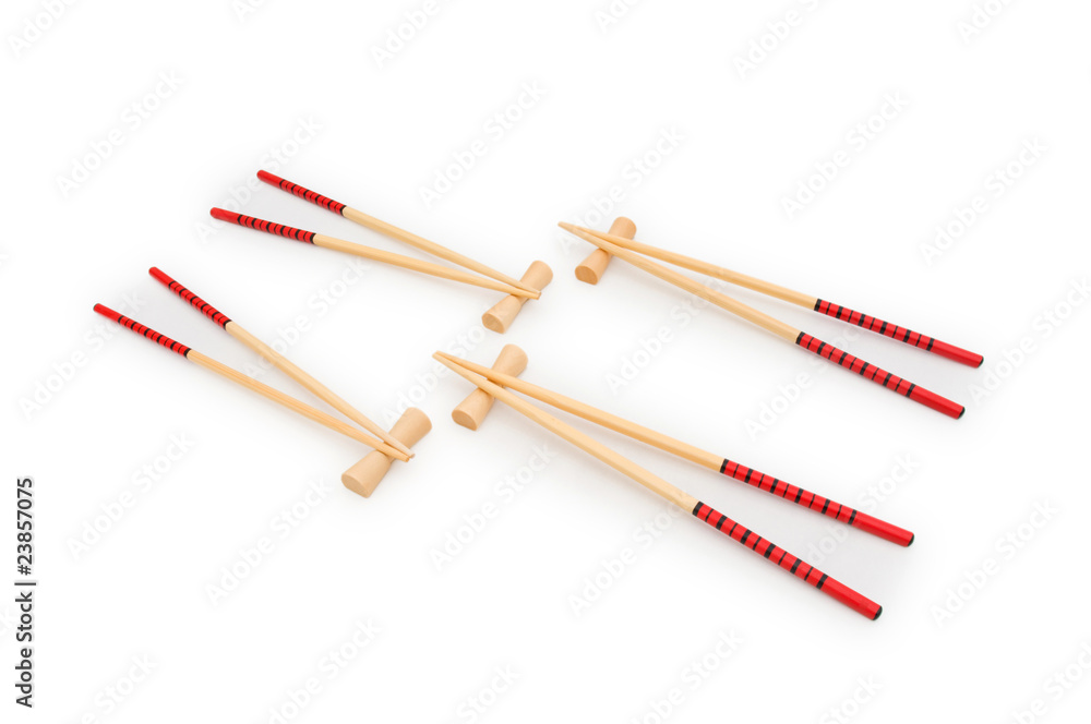 Wooden chopsticks isolated on the white background Wooden chopsticks isolated on the white background
