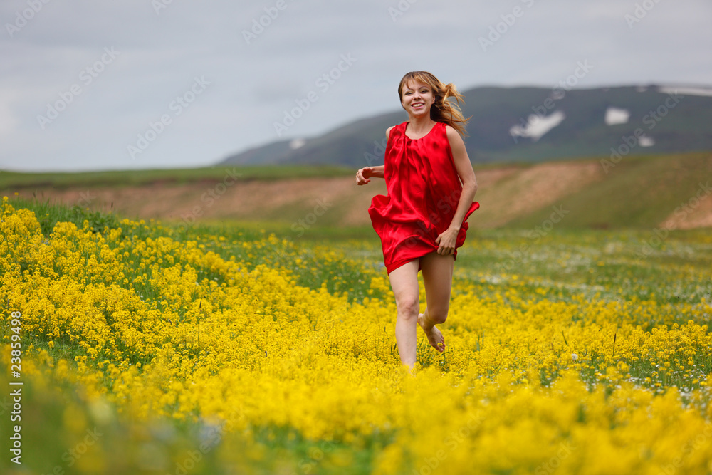 The girl in a blossoming field