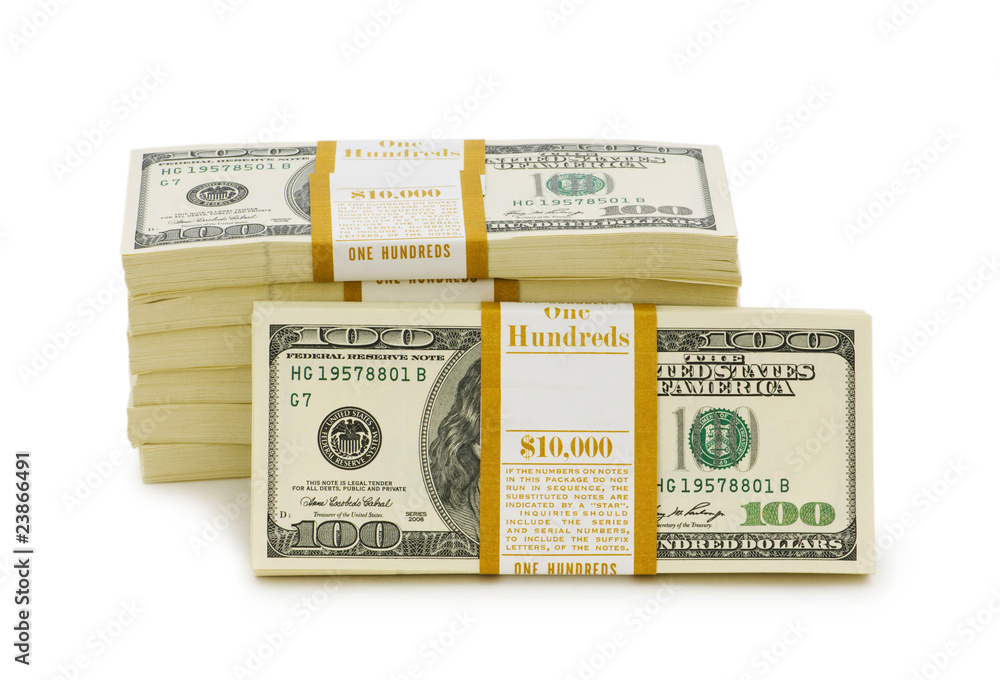 Stack of dollars isolated on the white Stack of dollars isolated on the white