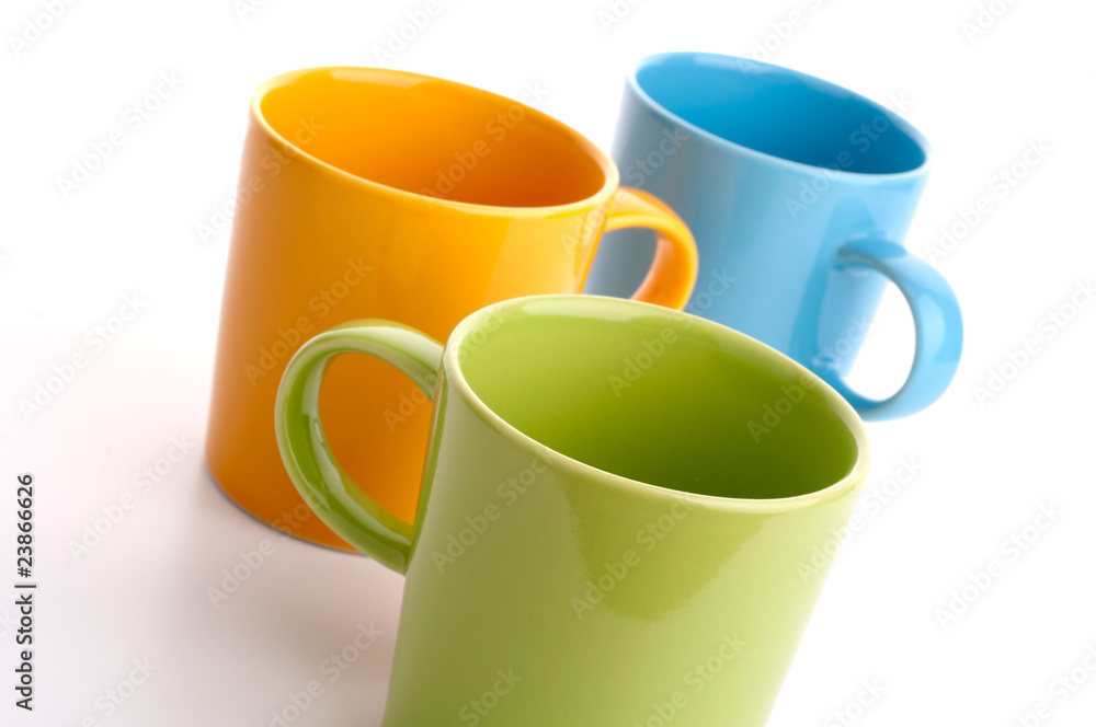 Colored cups. Isolated on white background. Colored cups. Isolated on white background.