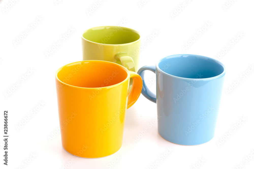 Colored cups. Isolated on white background. Colored cups. Isolated on white background.