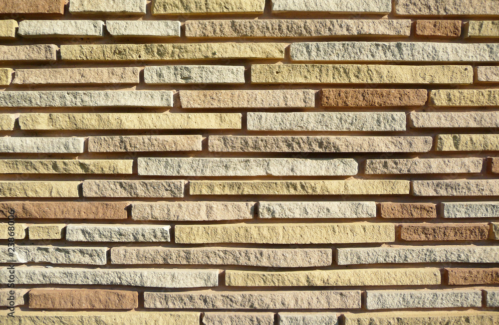 Colorful brick wall background with deep texture