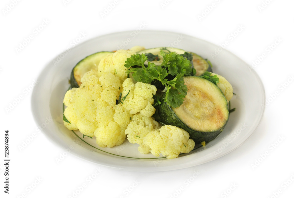Stewed vegetables in a bowl on a white background Stewed vegetables in a bowl on a white background